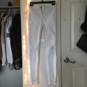 white distressed high rise skinny jeans